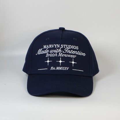 Navy blue cap with white text on a white background